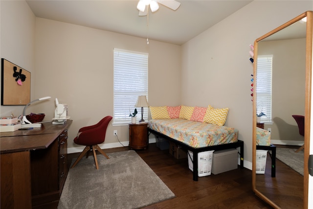 bedroom featuring ceiling fan and dark hardwood / wood-style flooring