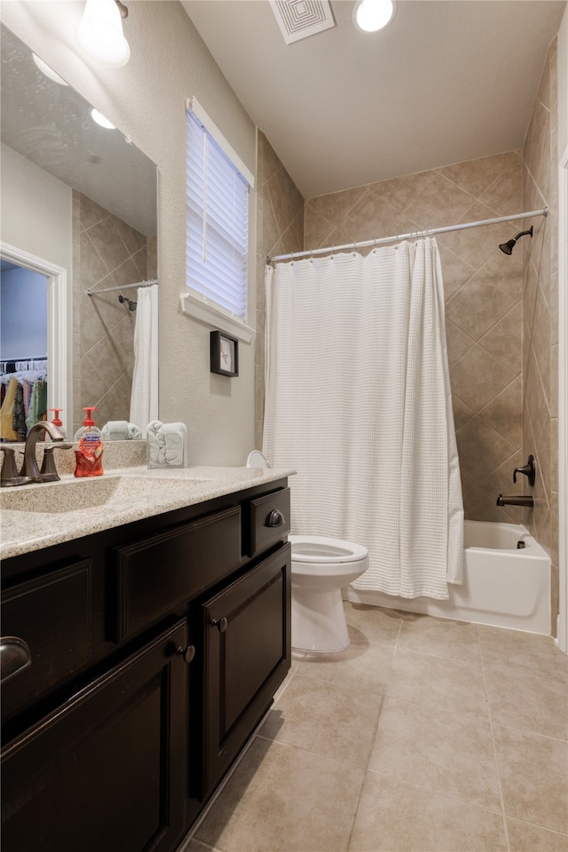 full bathroom with vanity, toilet, shower / bath combination with curtain, and tile patterned flooring