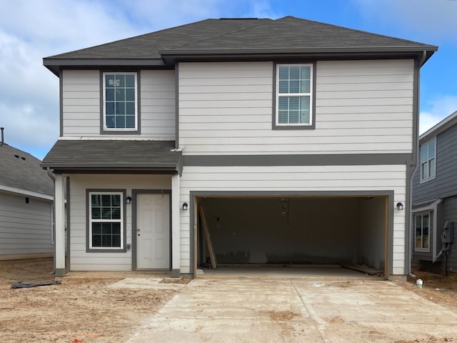 view of front of property featuring a garage