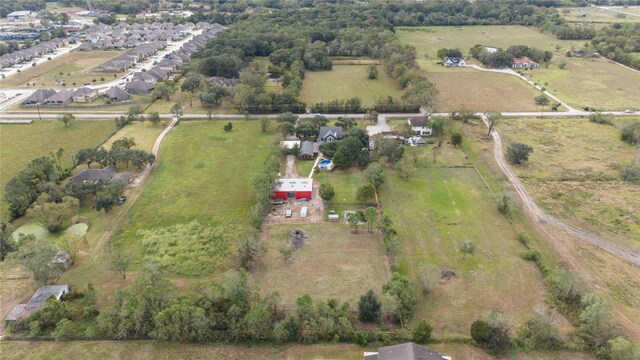 1290 County Road 145, Alvin, TX 77511 - aerial overview of property's location featuring rural landscape