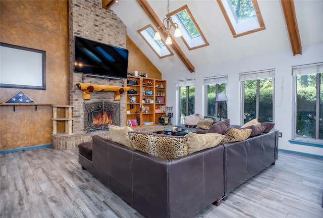 living room featuring beam ceiling, hardwood / wood-style flooring, high vaulted ceiling, and a fireplace