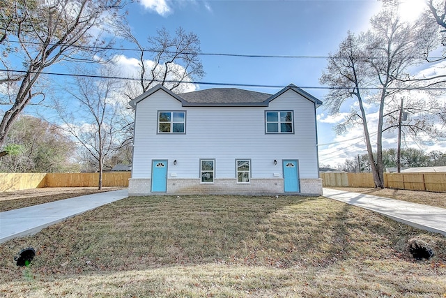 exterior space featuring a front lawn