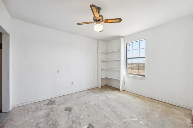 unfurnished bedroom featuring ceiling fan