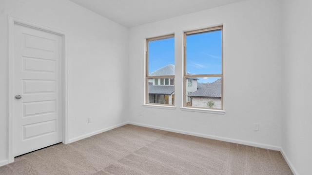 view of carpeted spare room