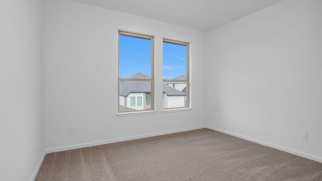 view of carpeted spare room