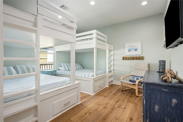 bedroom with light hardwood / wood-style flooring