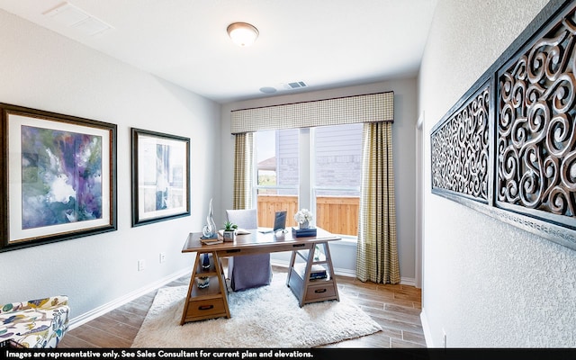 office featuring hardwood / wood-style floors