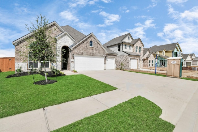 french provincial home with a front lawn, a garage, a residential view, driveway, and brick siding