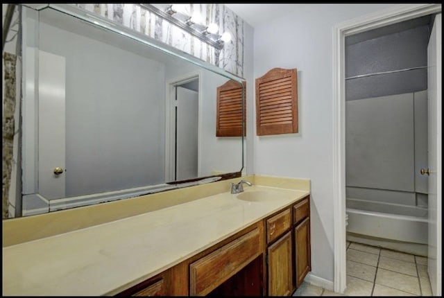 bathroom featuring vanity, shower / bath combination with curtain, and tile patterned floors