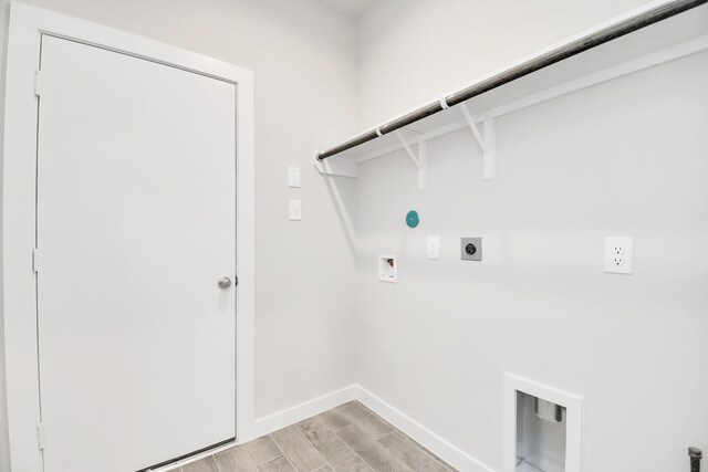 laundry room with electric dryer hookup, light wood-type flooring, and hookup for a washing machine