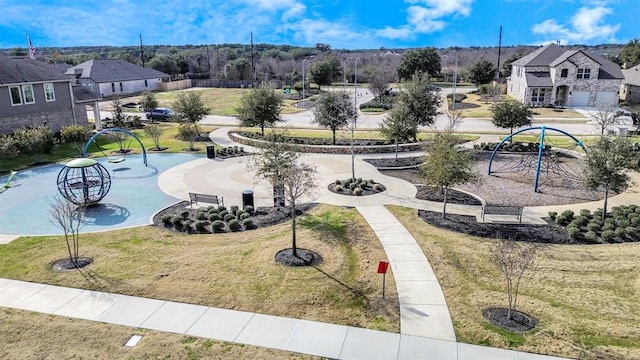 view of community featuring a lawn