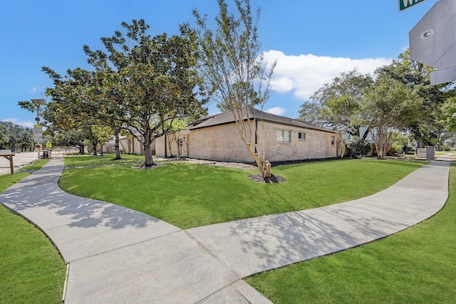 view of property exterior featuring a yard