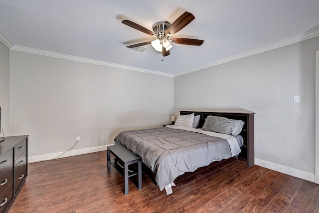 bedroom featuring ornamental molding, dark hardwood / wood-style floors, and ceiling fan