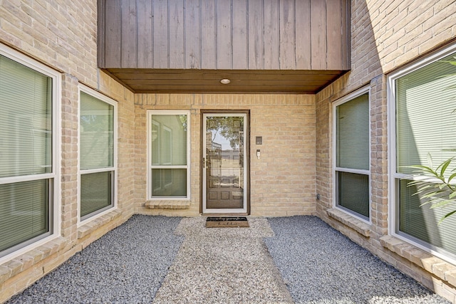 doorway to property featuring a patio