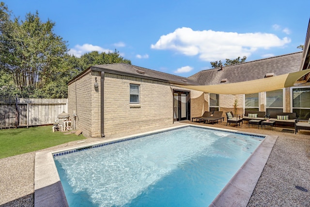 view of pool with a patio area and an outdoor hangout area