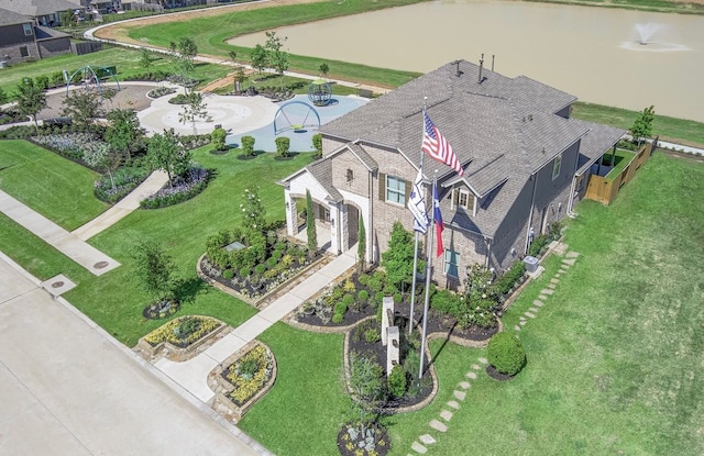 drone / aerial view featuring a water view