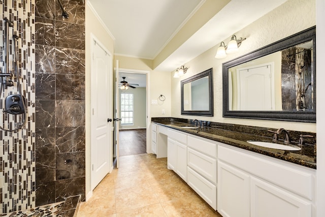 bathroom with ceiling fan, a tile shower, hardwood / wood-style flooring, ornamental molding, and vanity