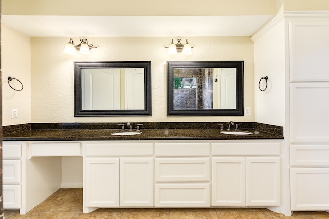 bathroom featuring vanity and tile patterned flooring