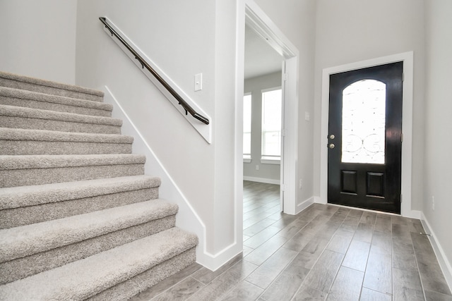 foyer entrance with hardwood / wood-style floors