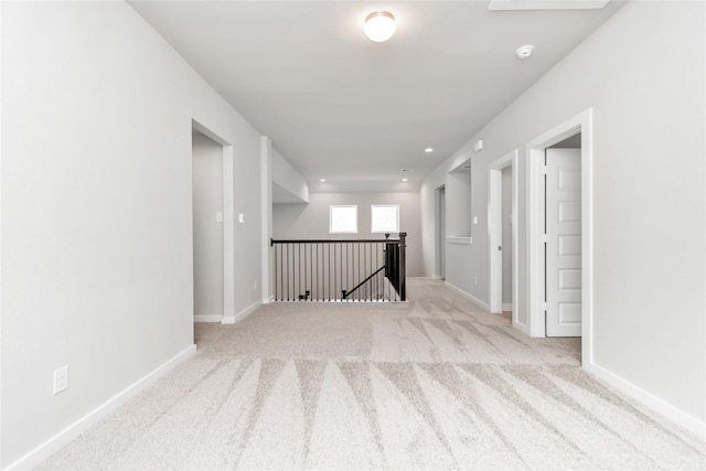 14707 Surfbird Ln, Houston, TX 77049 - empty room featuring carpet floors, baseboards, recessed lighting, and a smoke detector