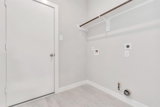 14707 Surfbird Ln, Houston, TX 77049 - clothes washing area featuring hookup for a gas dryer, hookup for an electric dryer, hookup for a washing machine, and baseboards
