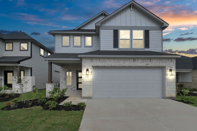 view of front of property featuring a garage