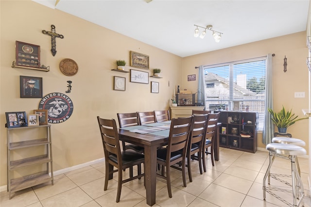 dining room featuring light tile patterned floors