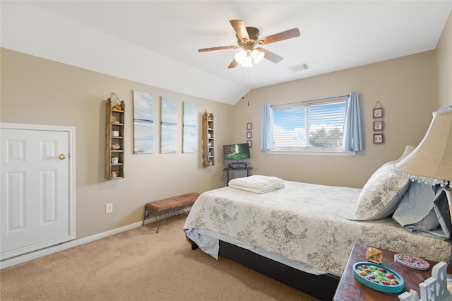 bedroom featuring lofted ceiling, carpet floors, and ceiling fan