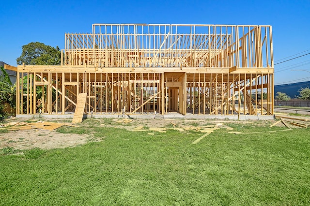 view of outdoor structure featuring a lawn