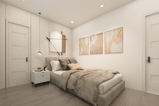 bedroom featuring wood-type flooring