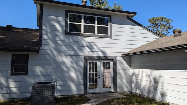 exterior space featuring central AC and french doors