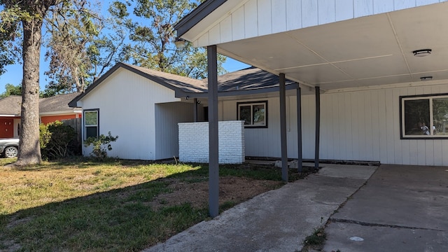 view of home's exterior with a lawn