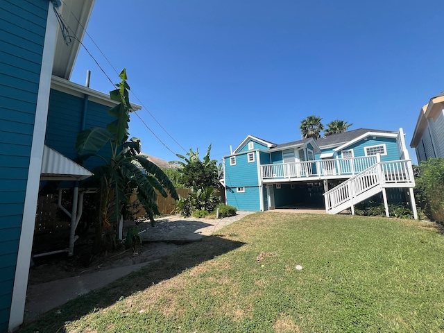 view of yard featuring a wooden deck