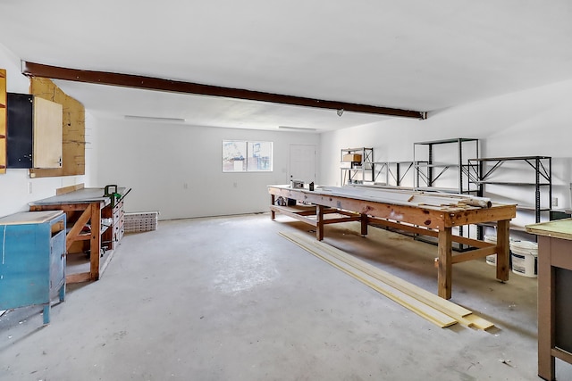 game room featuring beamed ceiling