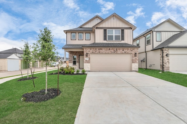 view of front of house featuring a garage and a front lawn