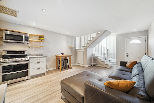 living room featuring light hardwood / wood-style floors