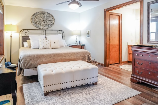 bedroom featuring wood-type flooring and ceiling fan