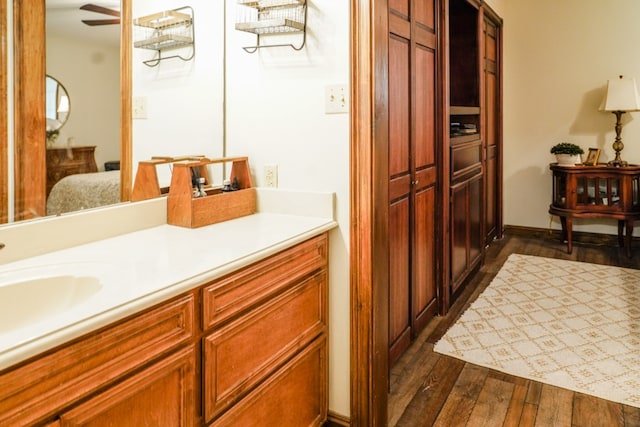 bathroom featuring vanity and hardwood / wood-style flooring