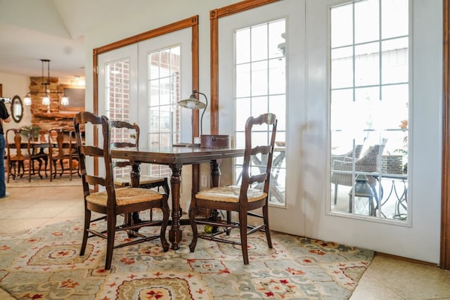 tiled dining room with french doors