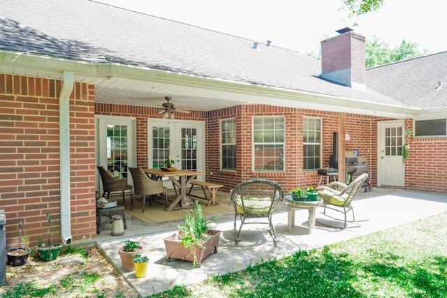 back of property featuring a patio area and ceiling fan