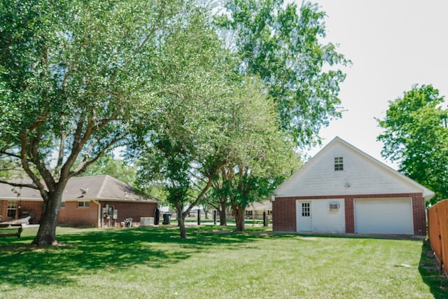 view of yard with a garage