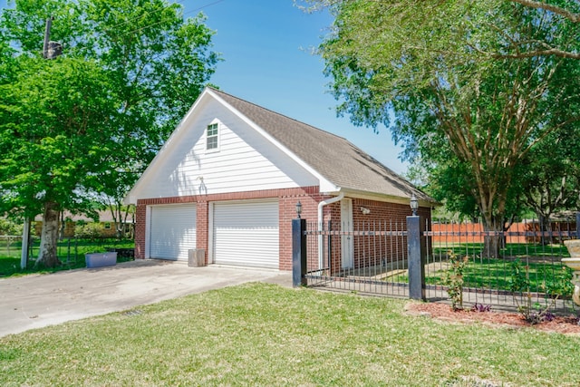 exterior space featuring a front yard and a garage