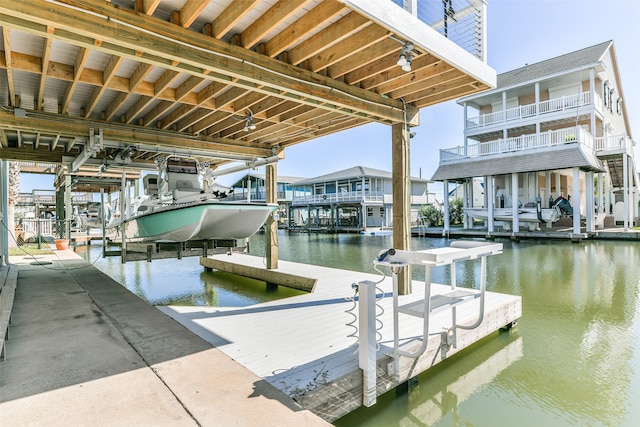 dock area with a water view