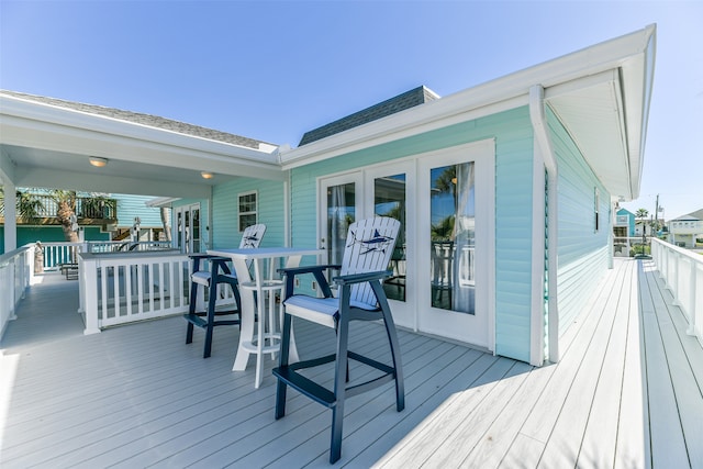 wooden deck with french doors