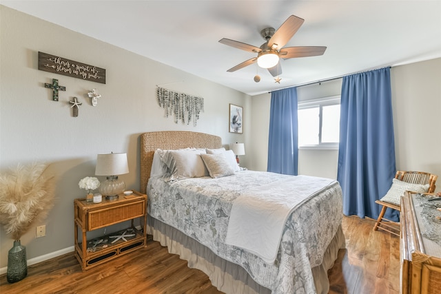 bedroom with ceiling fan and hardwood / wood-style floors