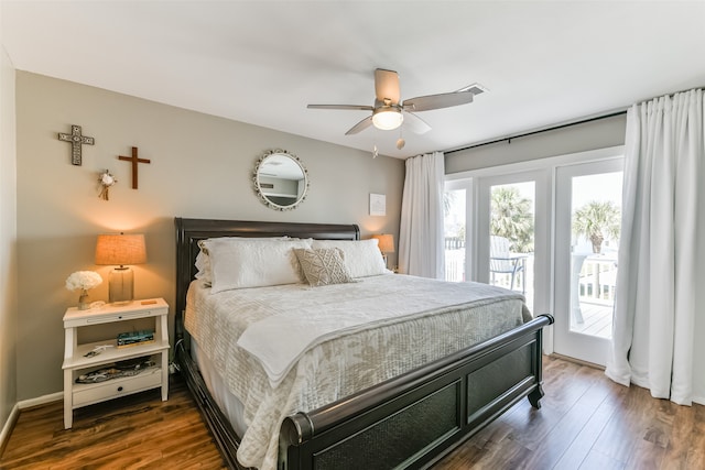 bedroom featuring access to exterior, ceiling fan, and dark wood-type flooring