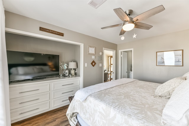 bedroom featuring ceiling fan and dark hardwood / wood-style flooring