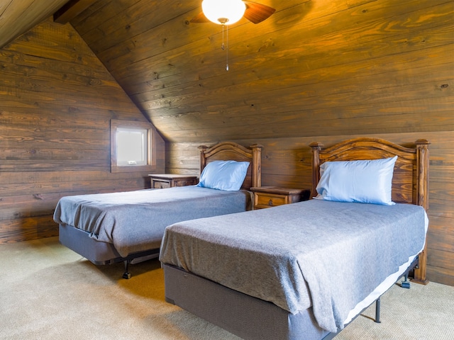 carpeted bedroom featuring wood walls, lofted ceiling with beams, and ceiling fan