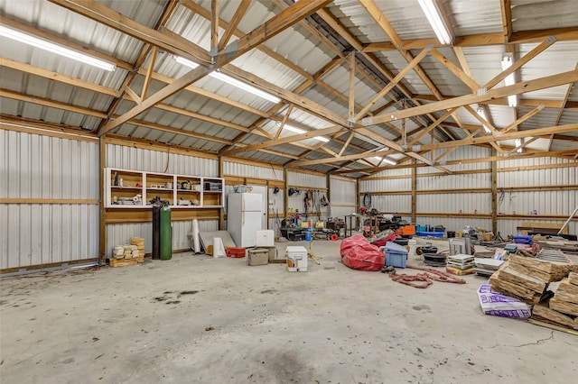 garage with white refrigerator