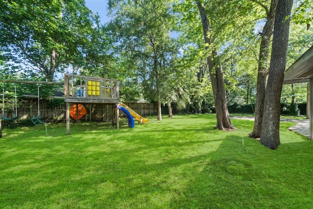 view of yard with a playground